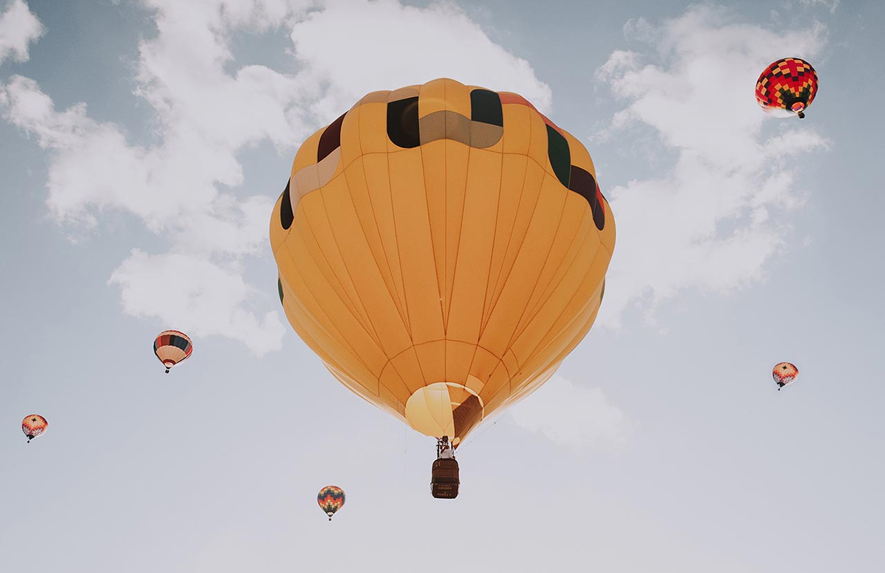 Hot air balloon drifting over Lake Tahoe